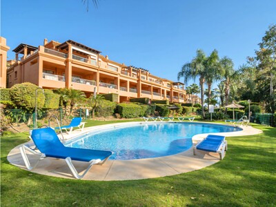 Spacious 2-bedroom garden apartment for sale in Benatalaya on the New Golden Mile, Estepona.