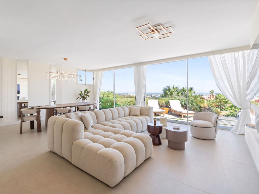 Lägenhet i Palacetes Los Belvederes, Nueva Andalucía Markplanslägenhet med sydvästterrass i en gated community i Nueva Andalucía med pool och öppen utsikt